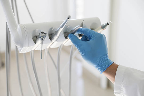 Professional Tooth Extraction technician working in Mustang Ridge, TX